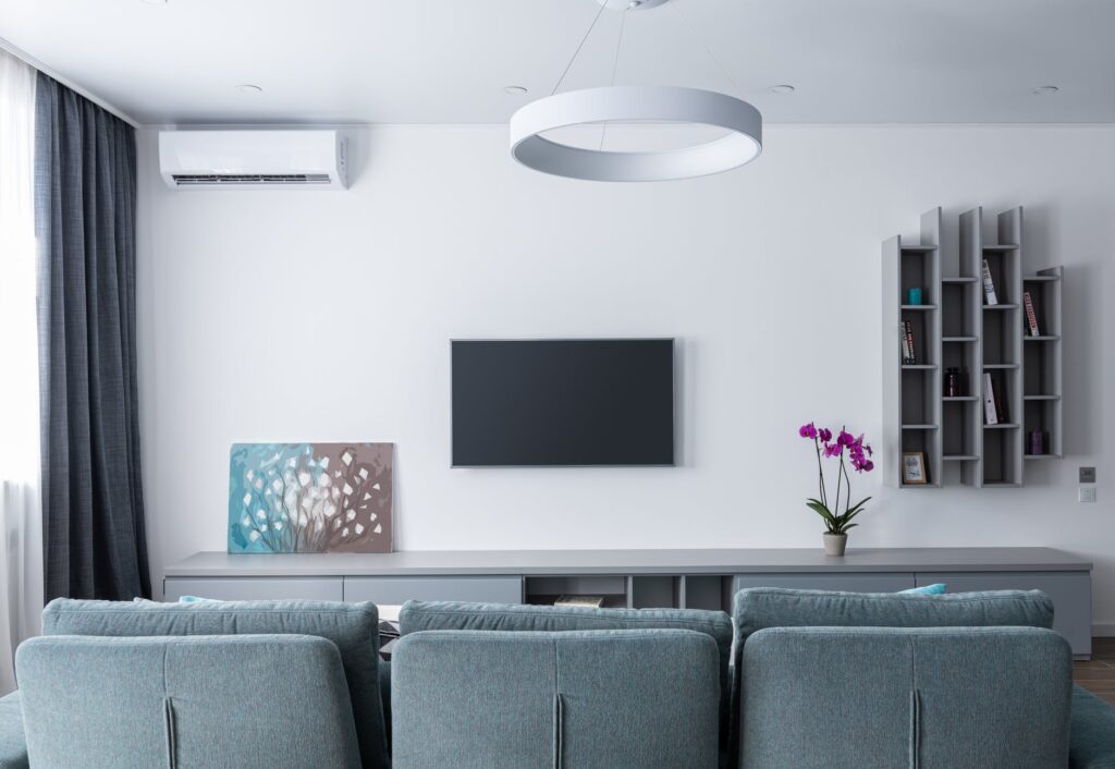 modern interior of lounge with tv and picture on shelf